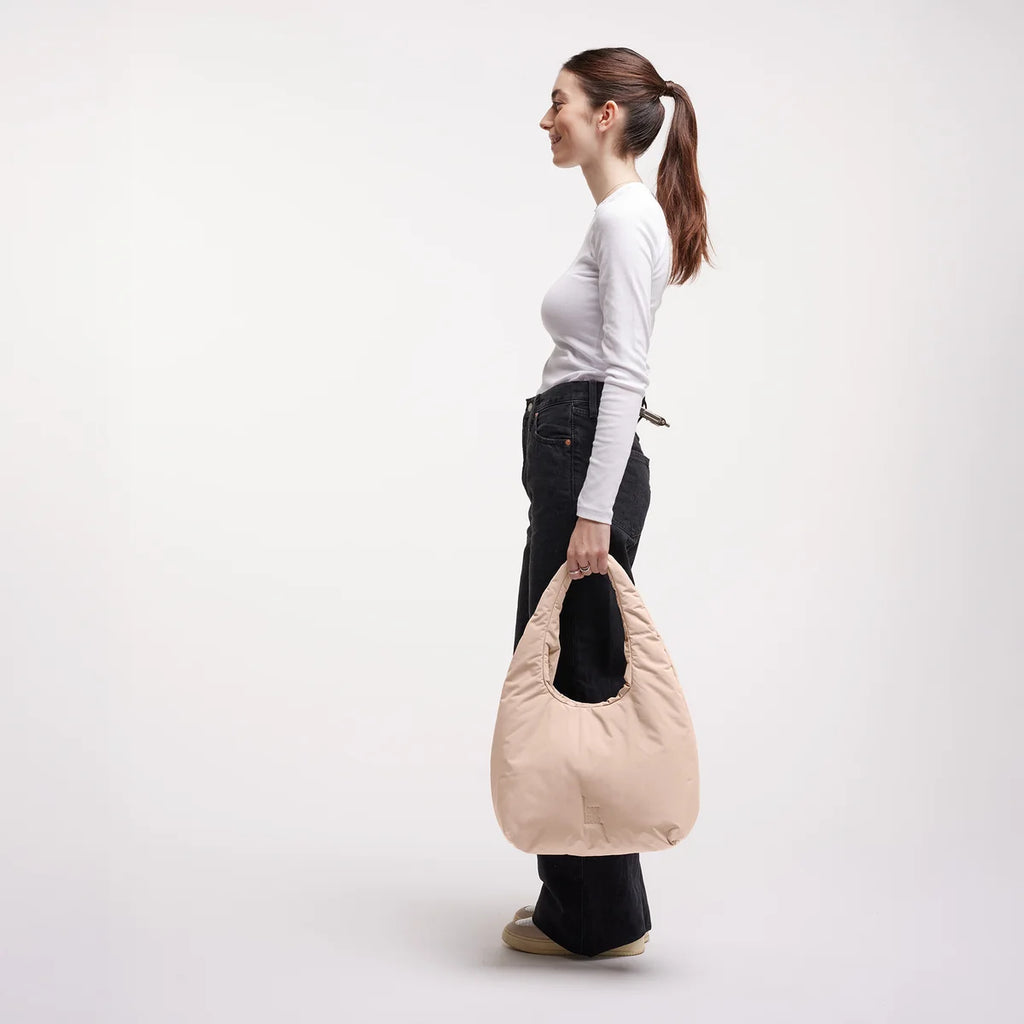 Transit puffer shoulder bag